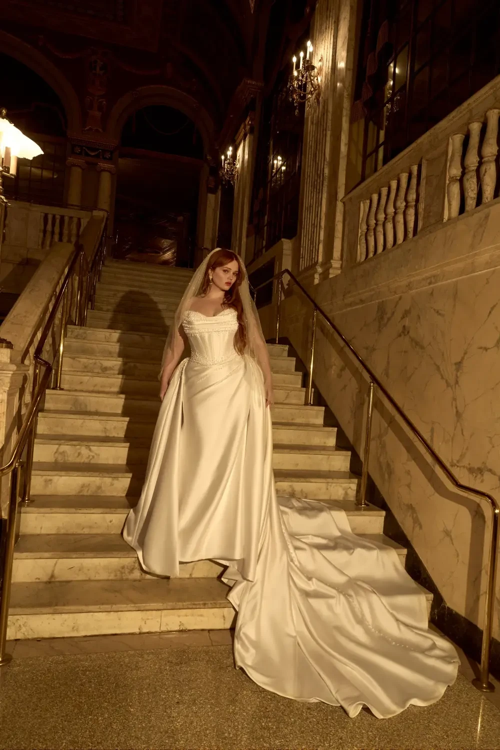 model is wearing a sleeveless a-line bridal gown